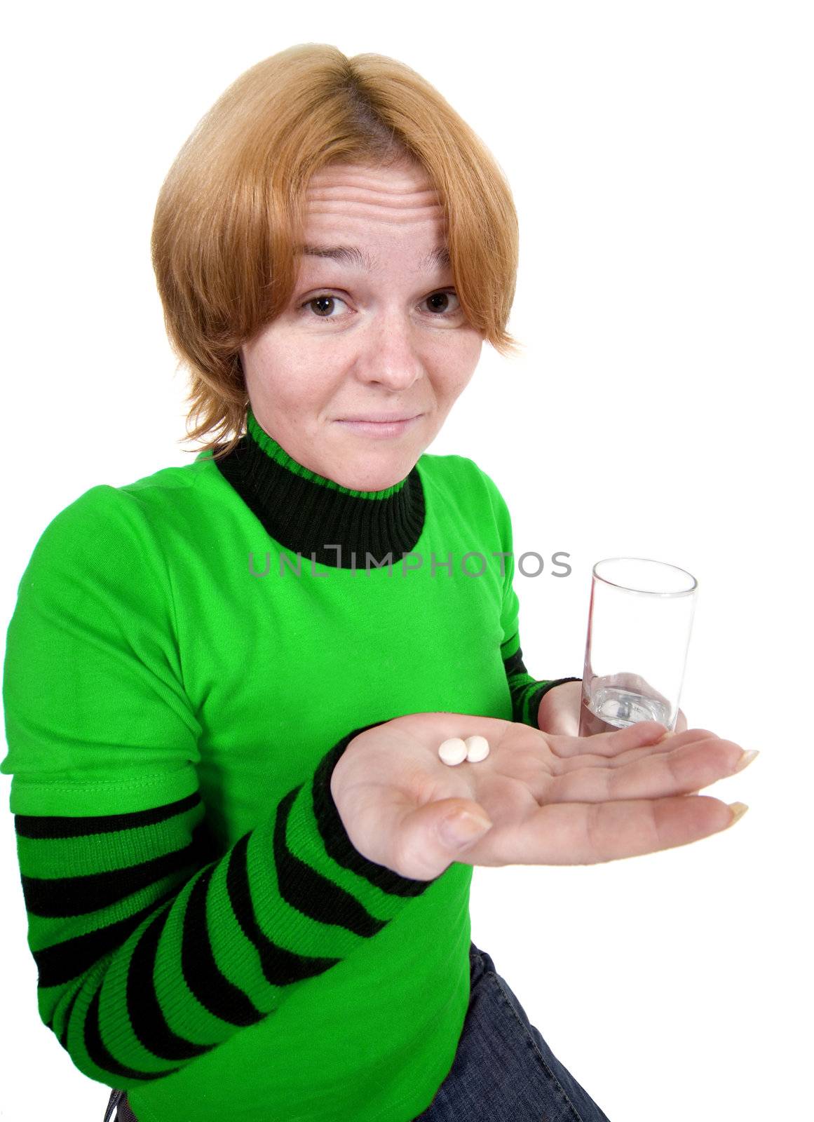 The girl with a glass and tablets on a white background