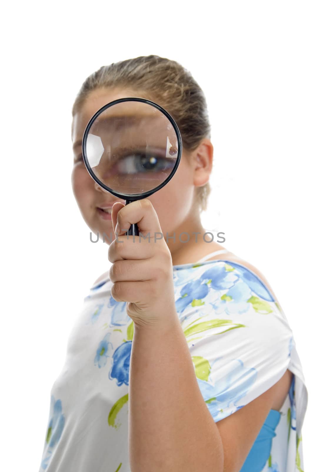 girl looking through lens against white background