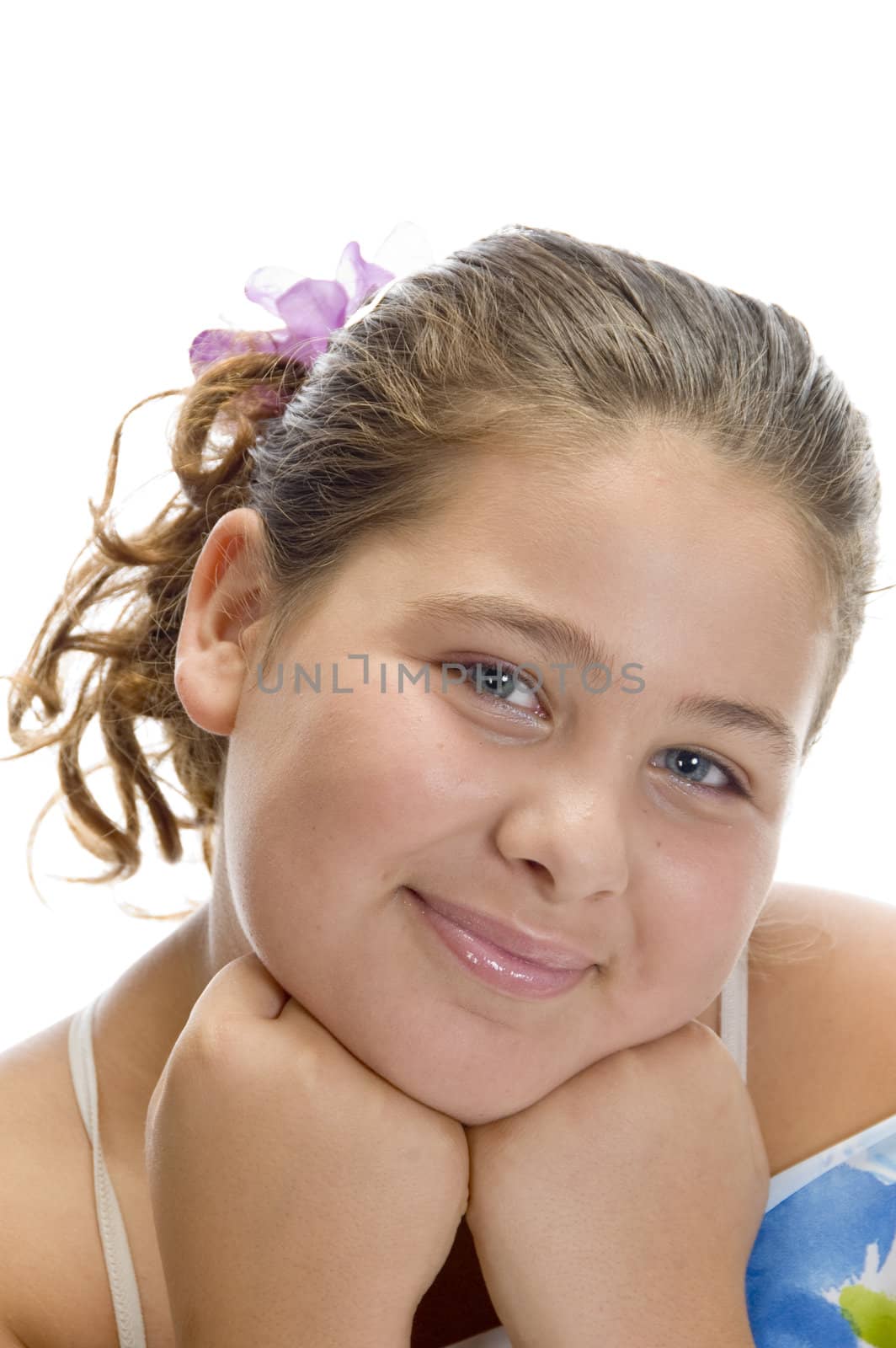 portrait of young girl against white background