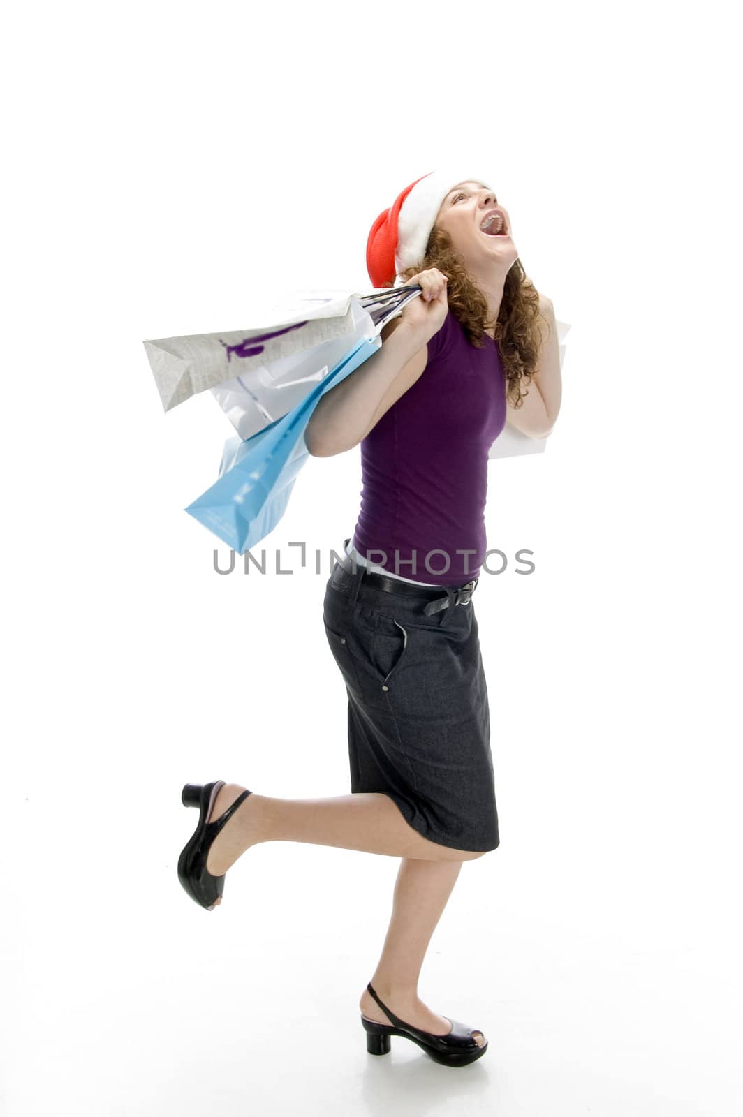 cheerful lady holding carry bags with white background