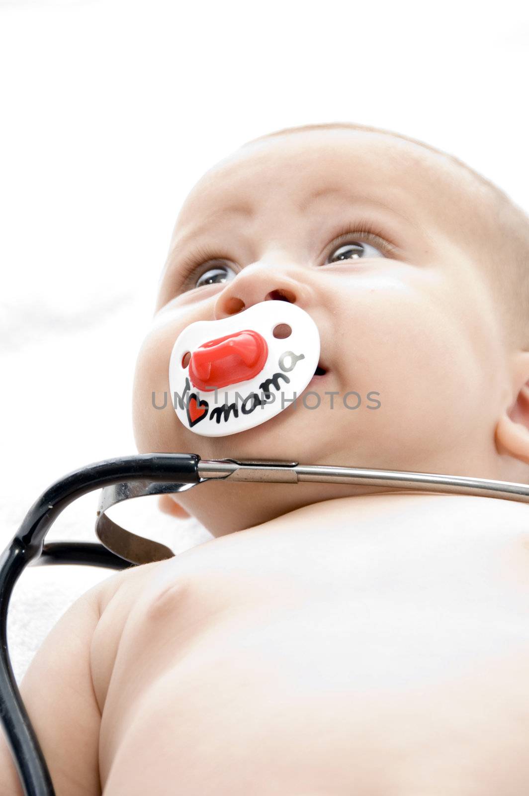 cheerful child with stethoscope with white background