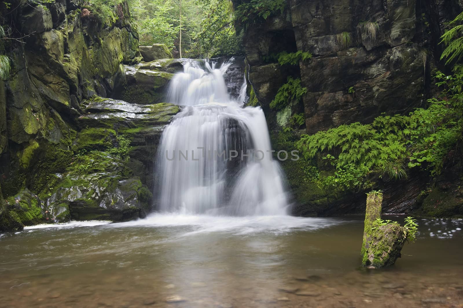 Shot of the fall of water.
Stream Huntava - natural area - nature preserve.
Resov, Czech republic, Europe.