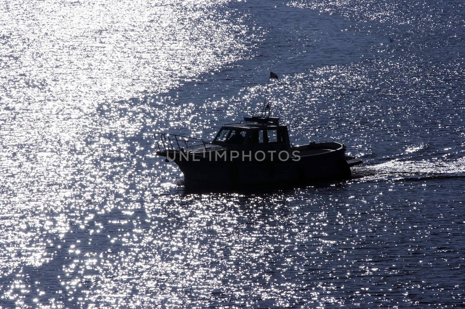 Shot of the boat on tne river - dusk