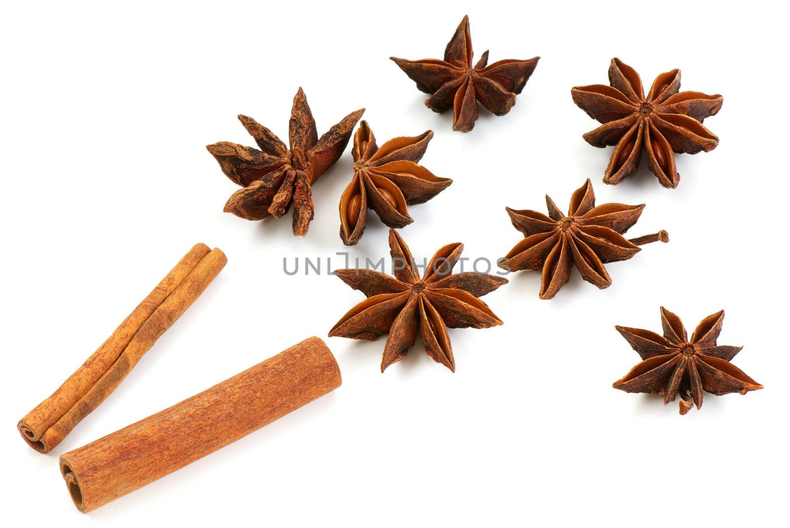 Star anise and cinnamon sticks, on a white background