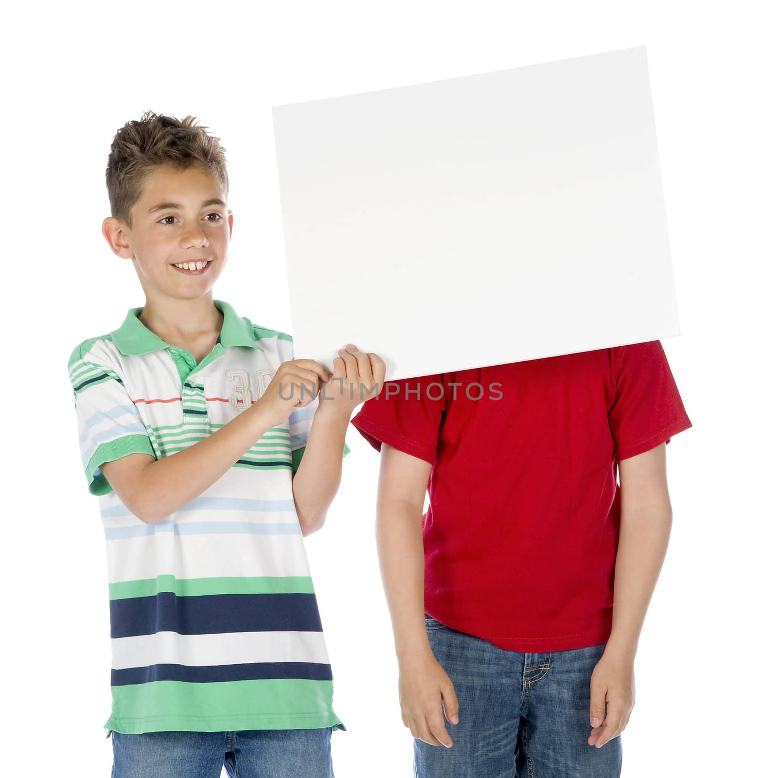 two boys with a sign