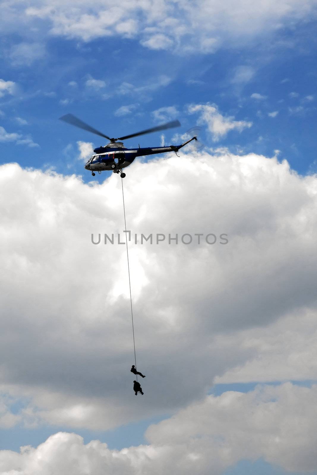 Police squad in action with helicopter