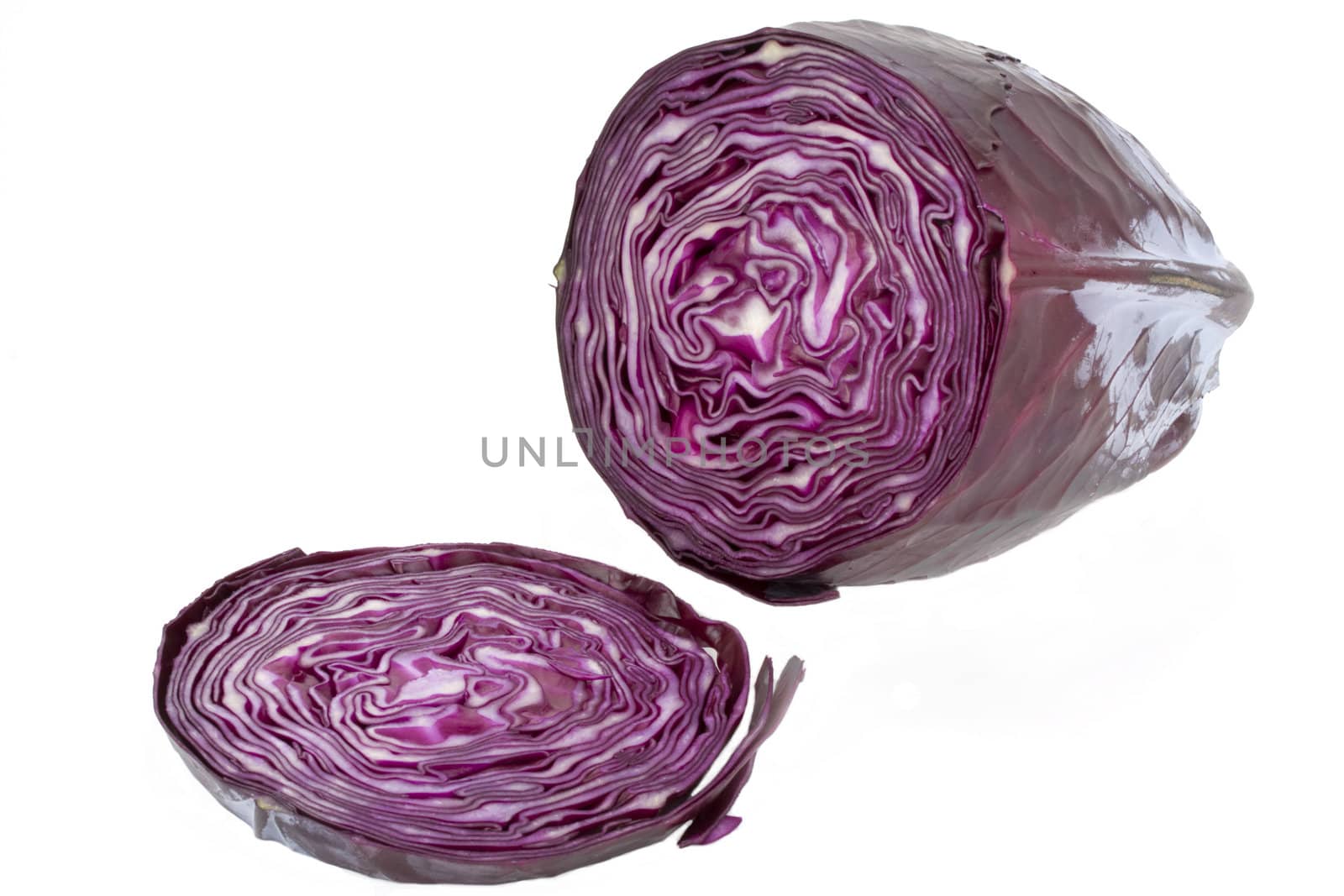 sliced red cabbage on white background by bernjuer