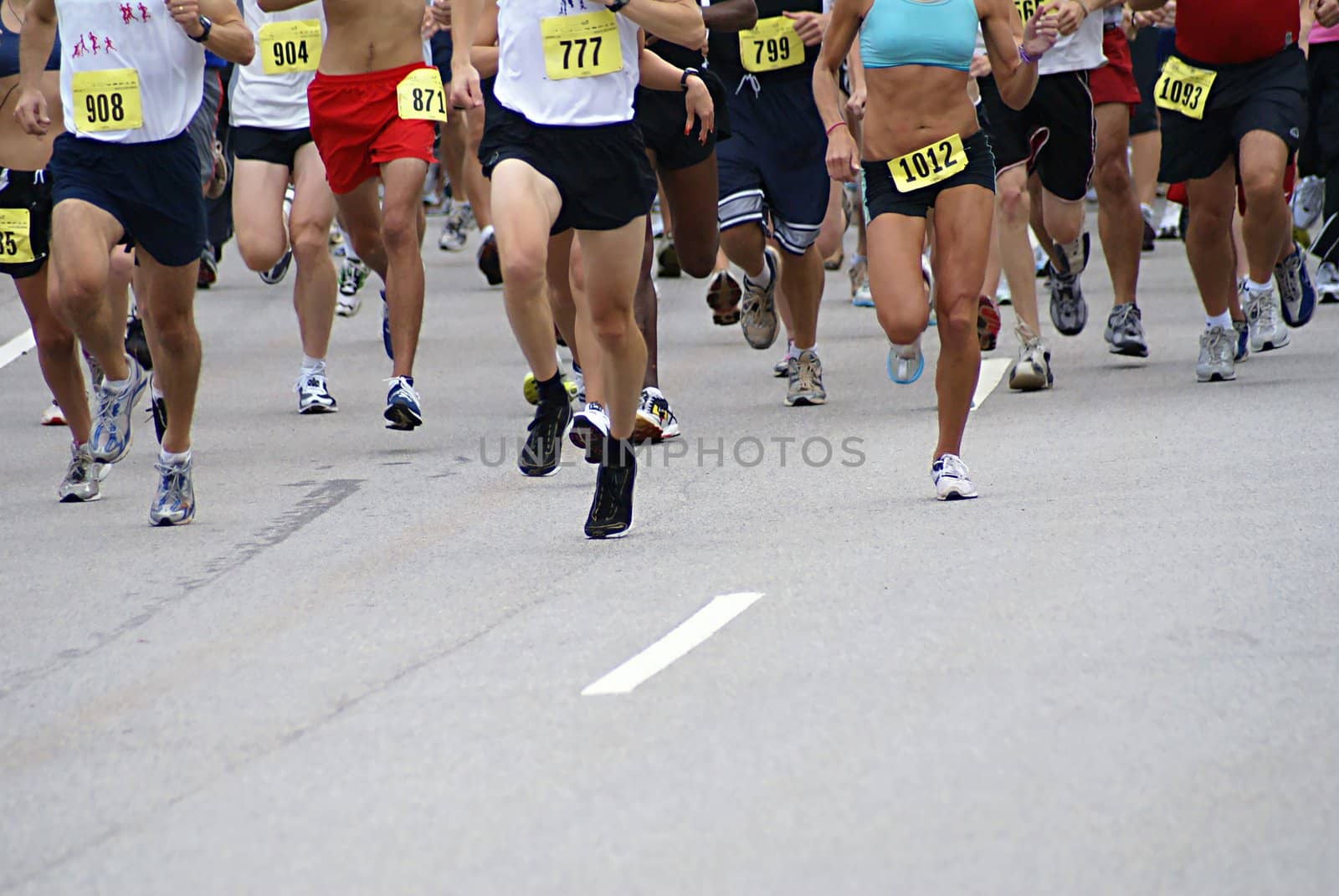 Big running race on foot during the day.                