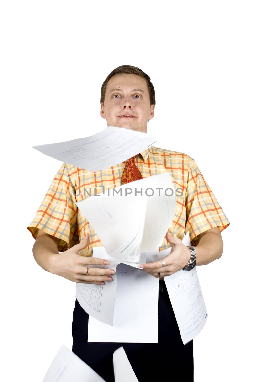 Young, successful and happy businessman. Throwing documents sheets in the air.