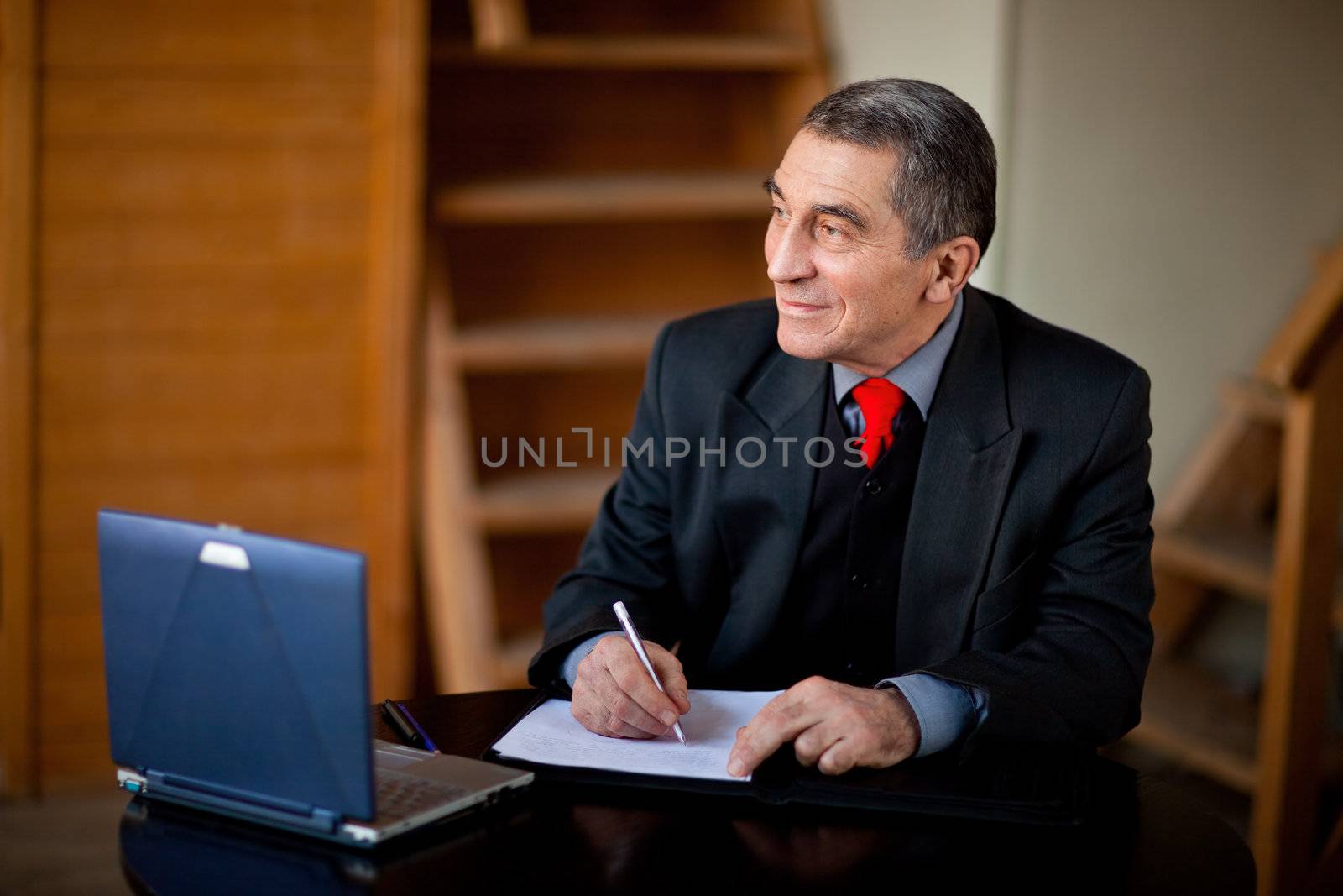 Writing businessman by Gravicapa