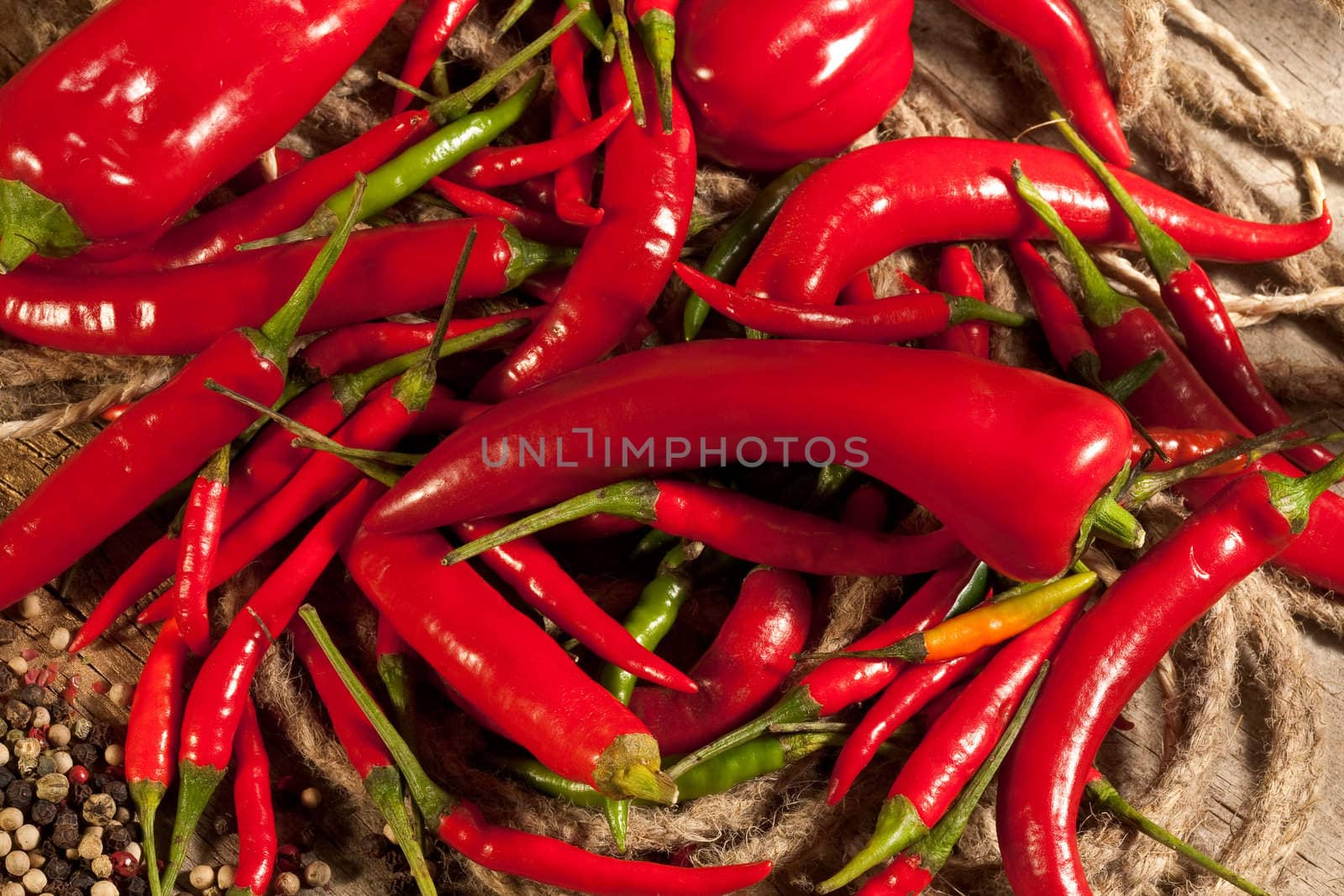 Several of red and green cayenne peppers