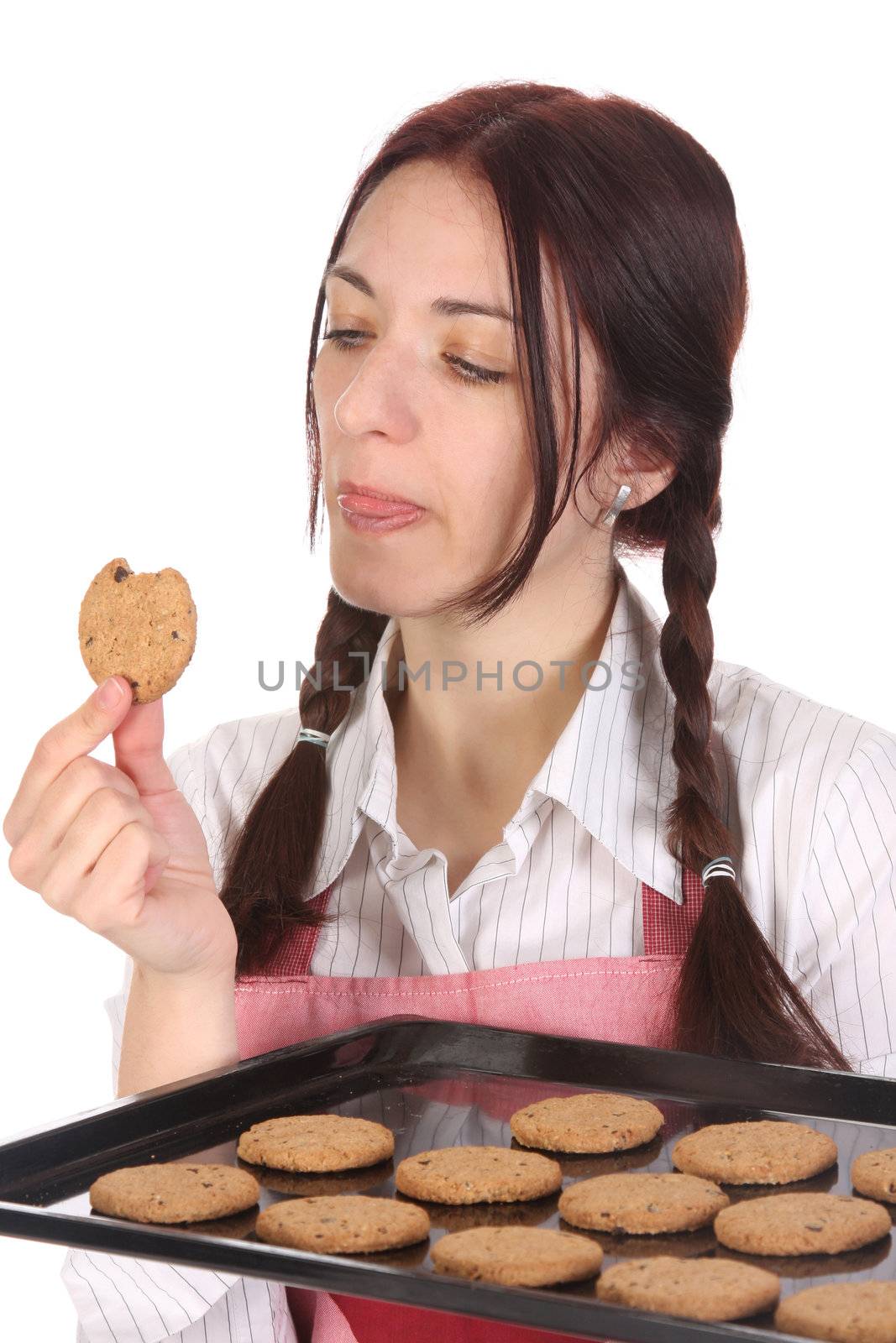 beautiful housewife eating a slice of chocolate cake 