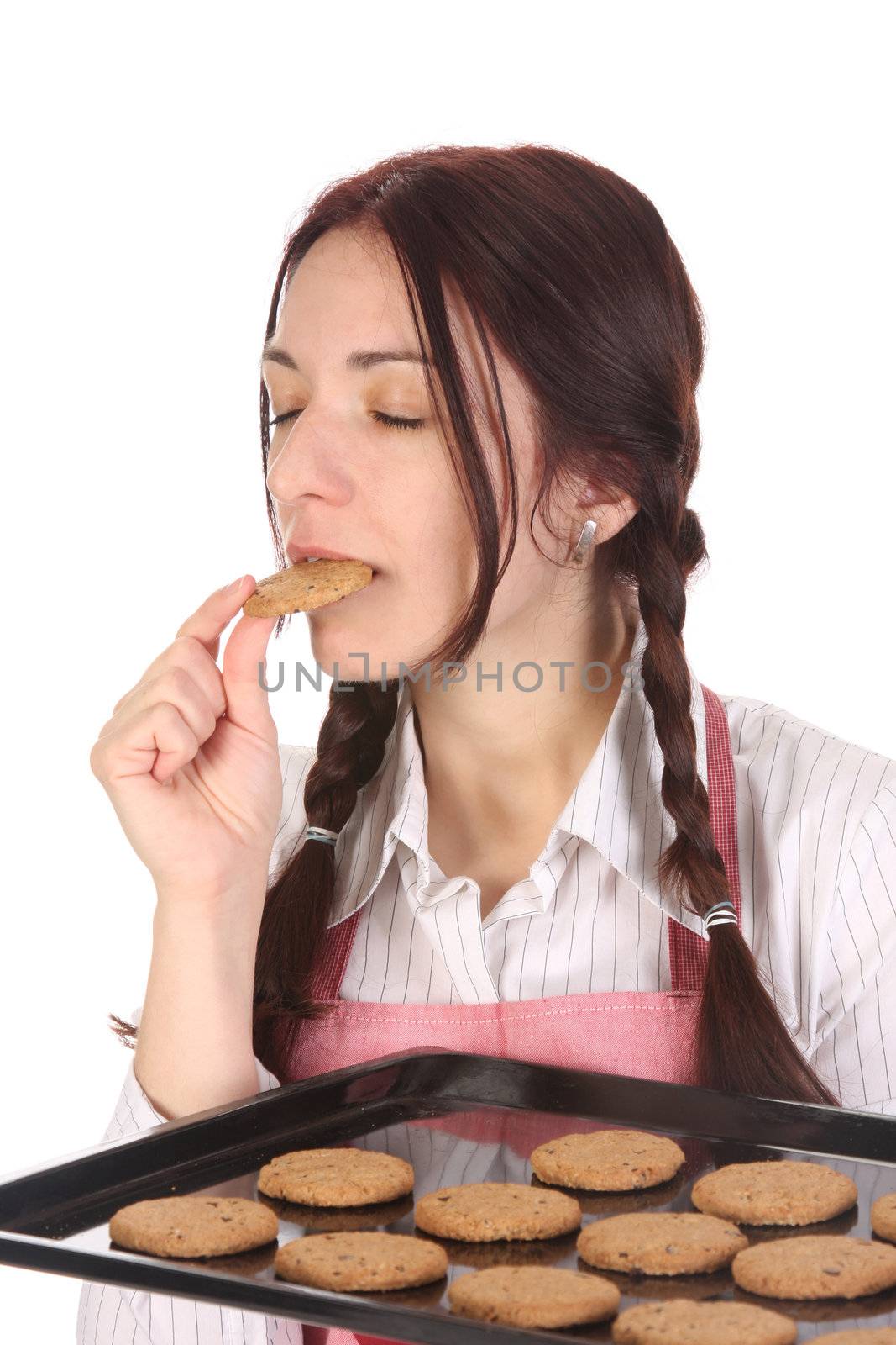 beautiful housewife eating a slice of chocolate cake 
