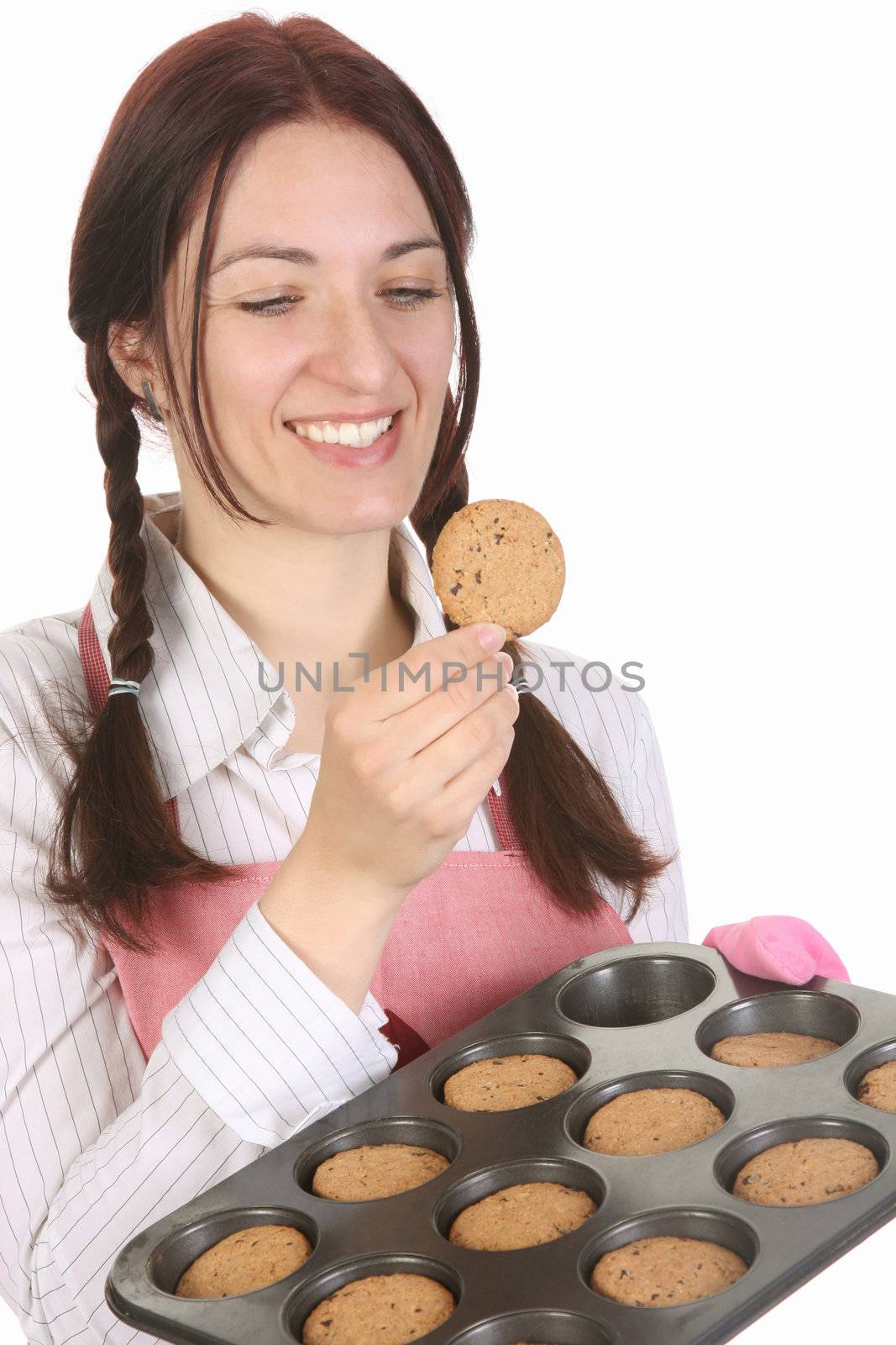 beautiful housewife eating a slice of chocolate cake 