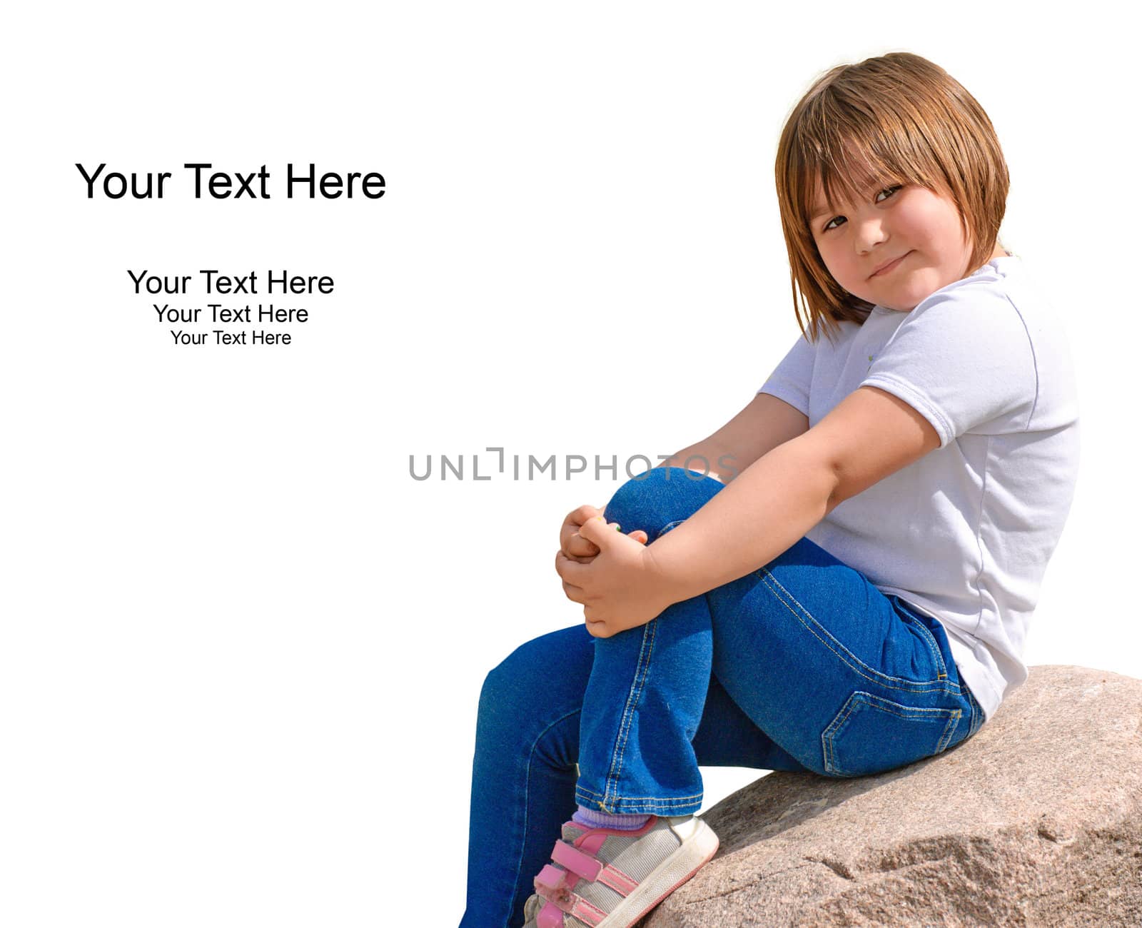 A cute five year old girl posing on a rock outside, isolated against a white background.