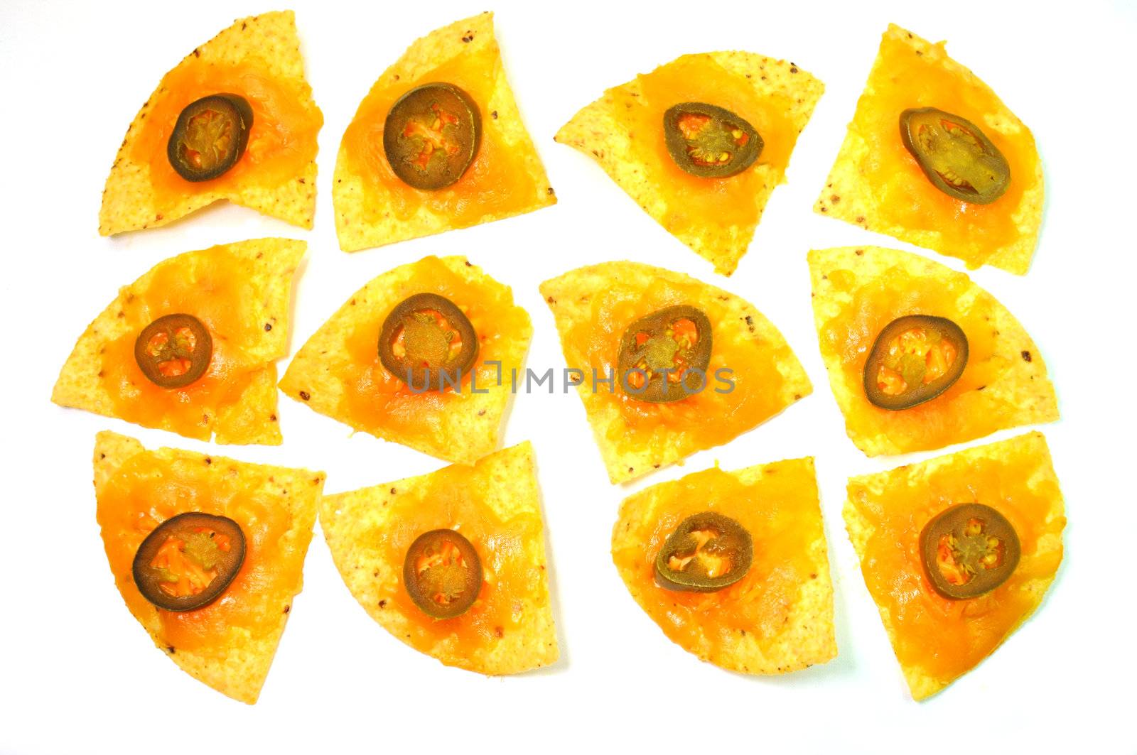 A dozen nachos isolated on white background.