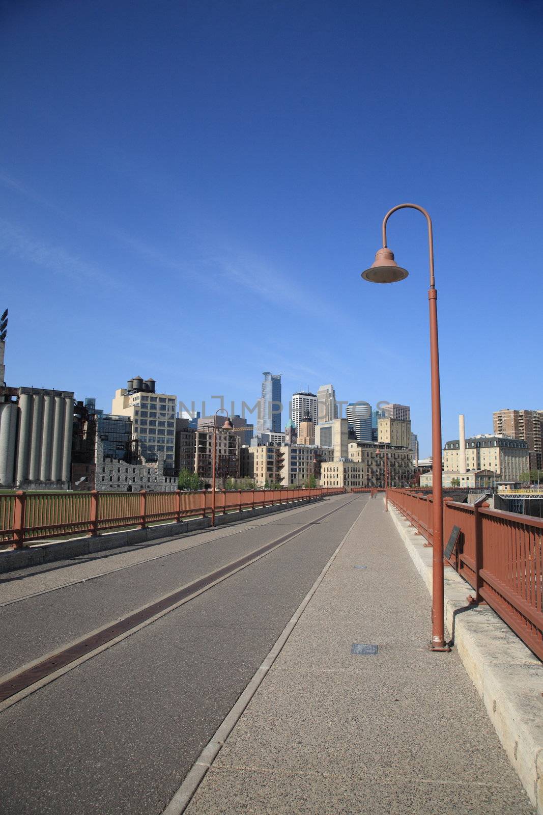 Skyscrapers and old fashioned light poles from Stone Arch Bridge