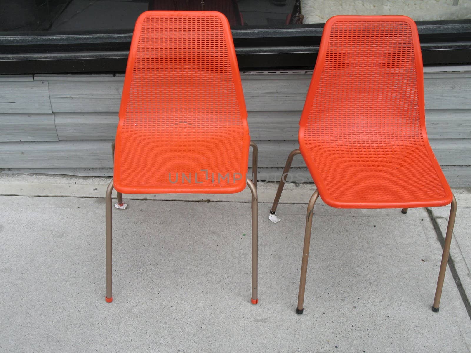 two old orange chairs