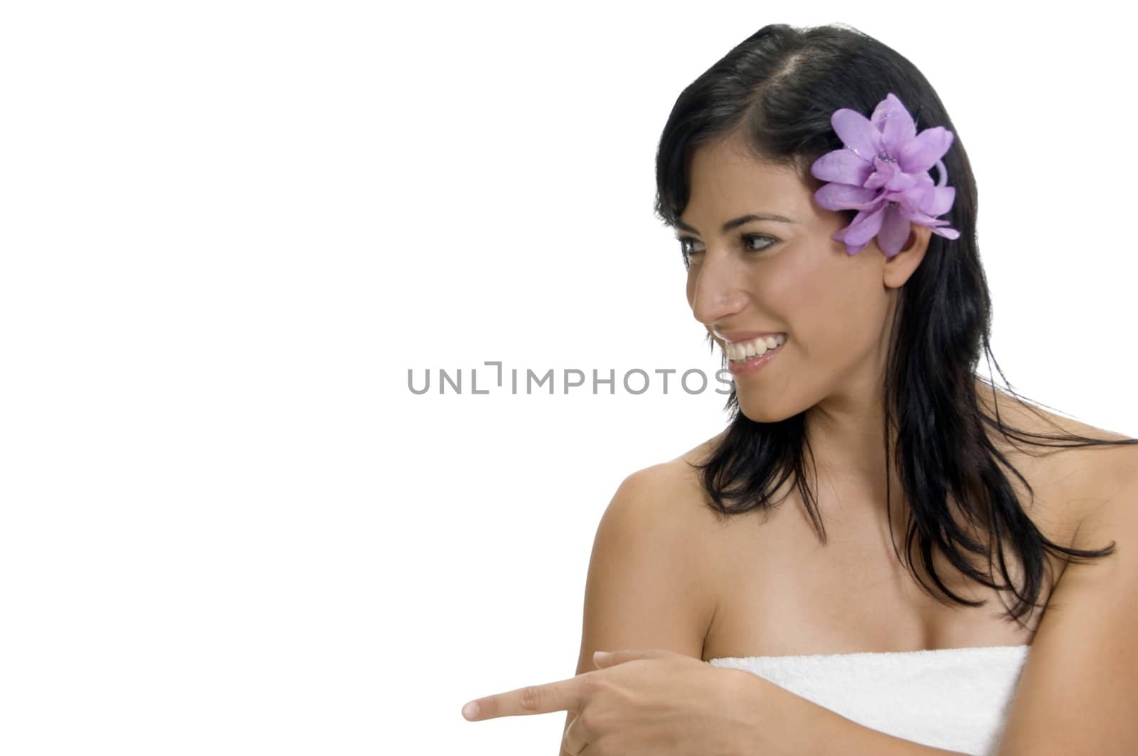 smiling lady pointing side with white background