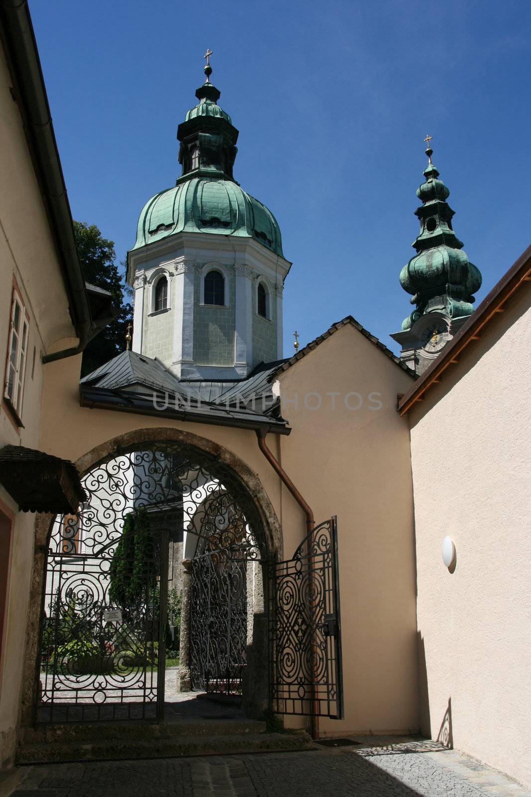Saint Peter's Abbey Church (Stiftskirche St. Peter) and the entrance to the cemetery in Salzburg, Austria