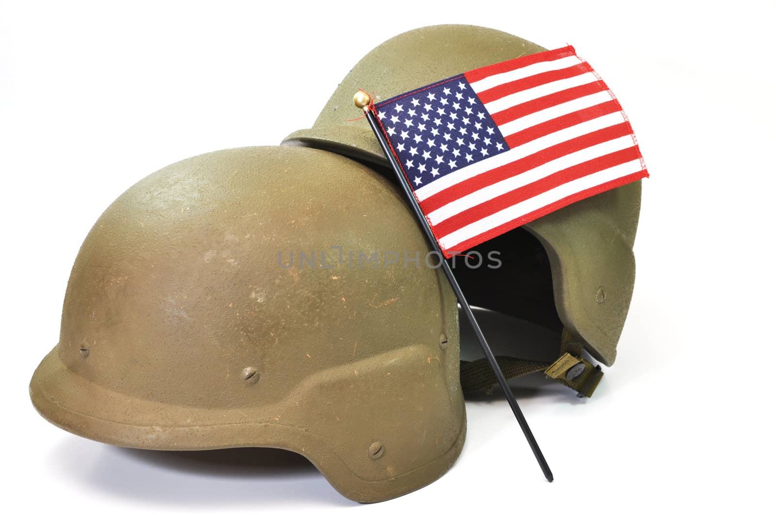 Military helmets and American flag isolated on white background.
