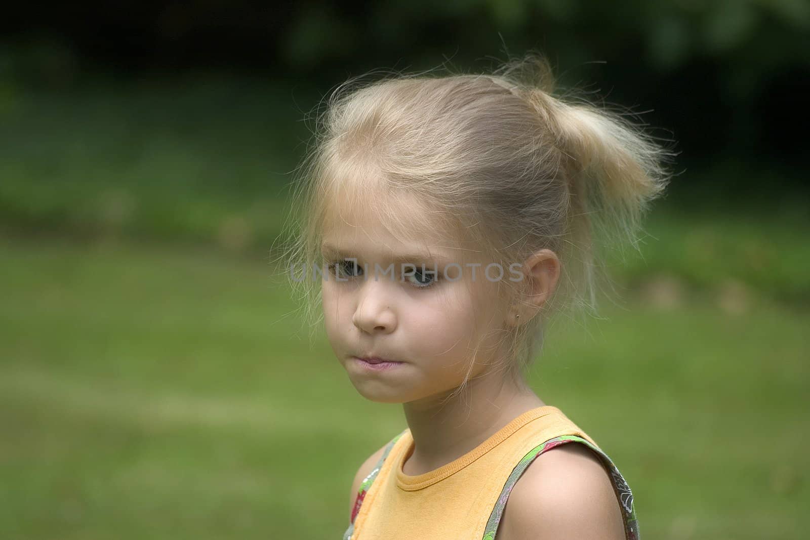 Portrait of girls in the open air on the blur background 