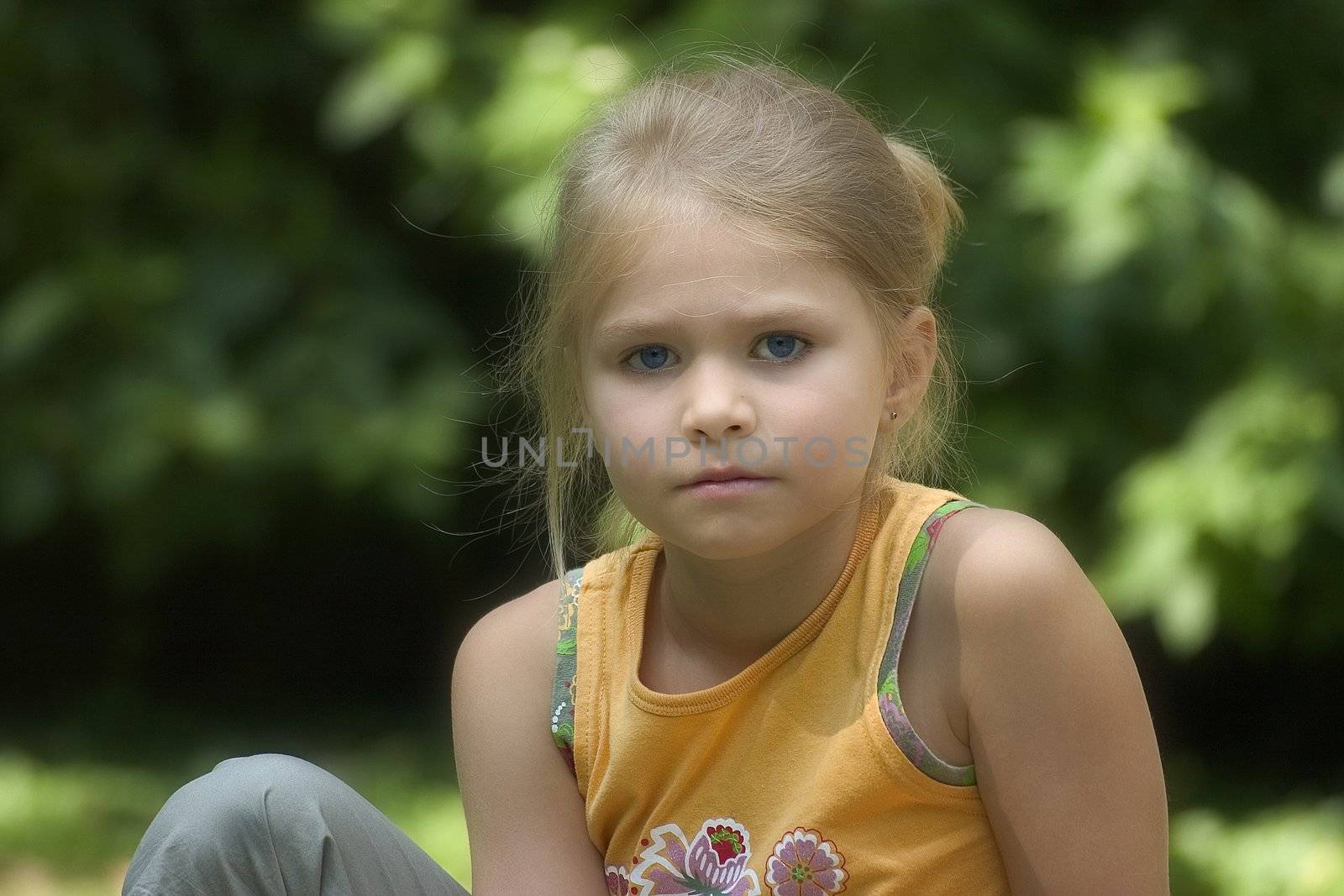 Portrait of girls in the open air on the blur background 