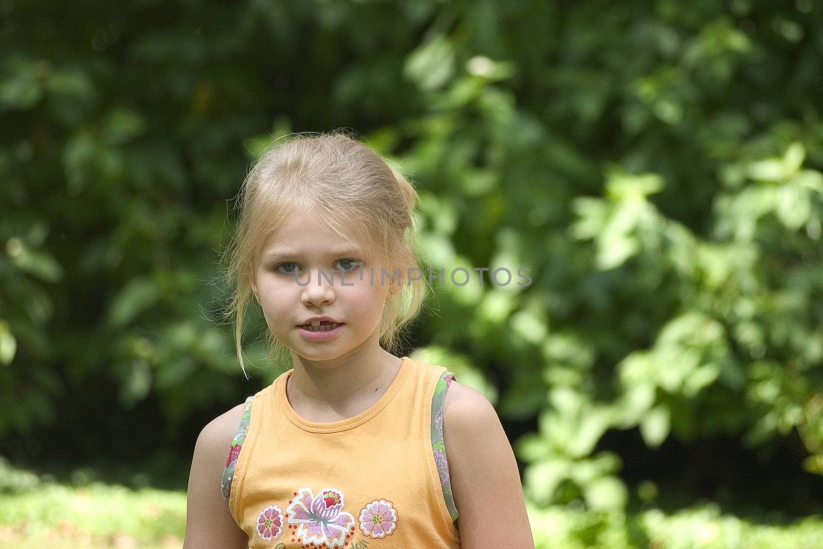 Portrait of girls in the open air on the blur background 