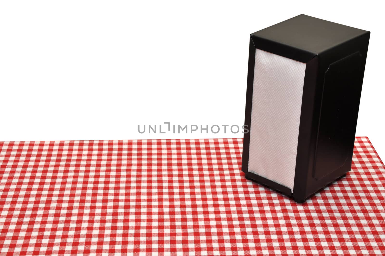 Napkin holder on diner table.  Isolated on white background with clipping path.  