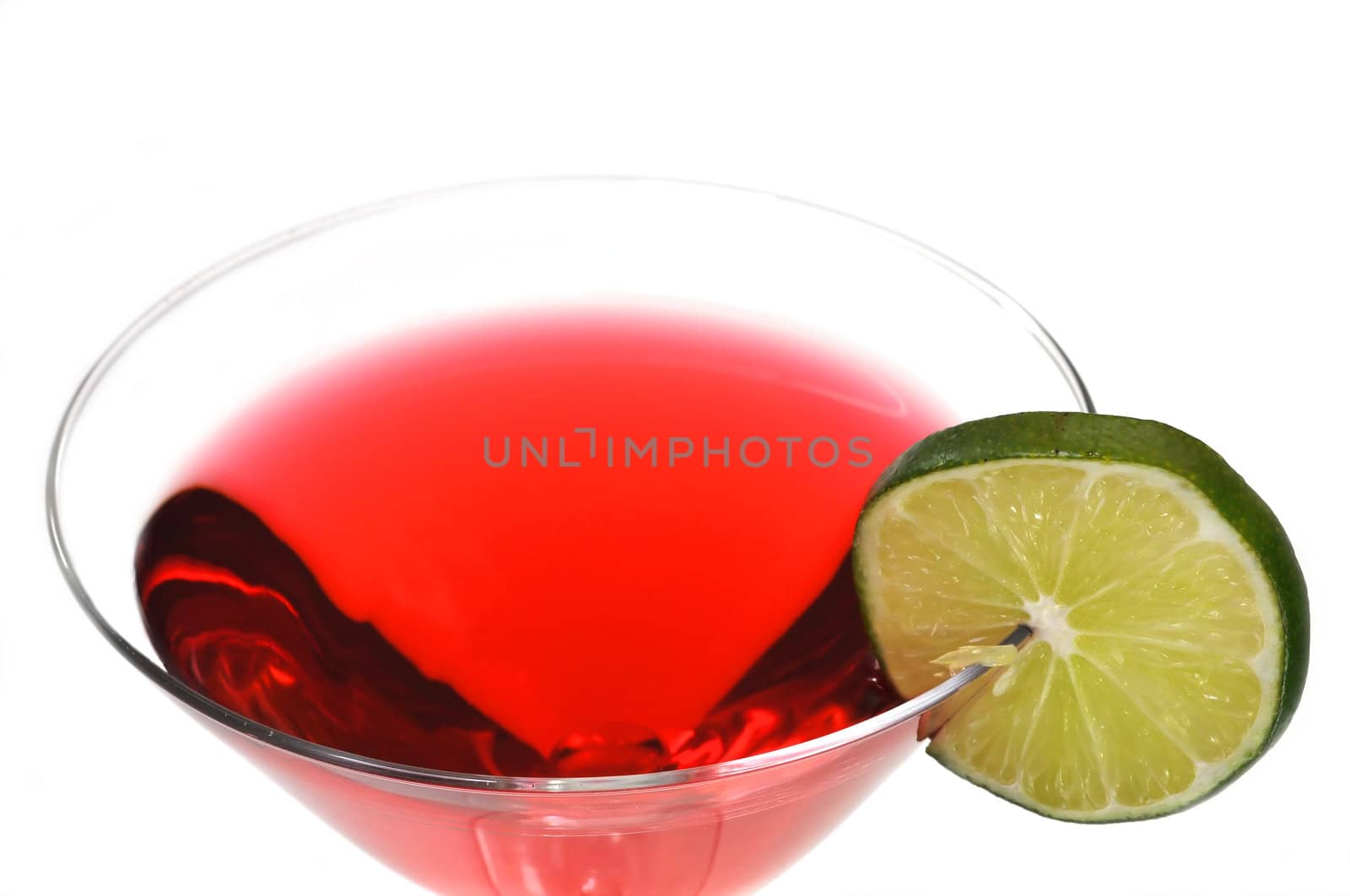 Red Cosmopolitan with lime slice isolated on white background. 