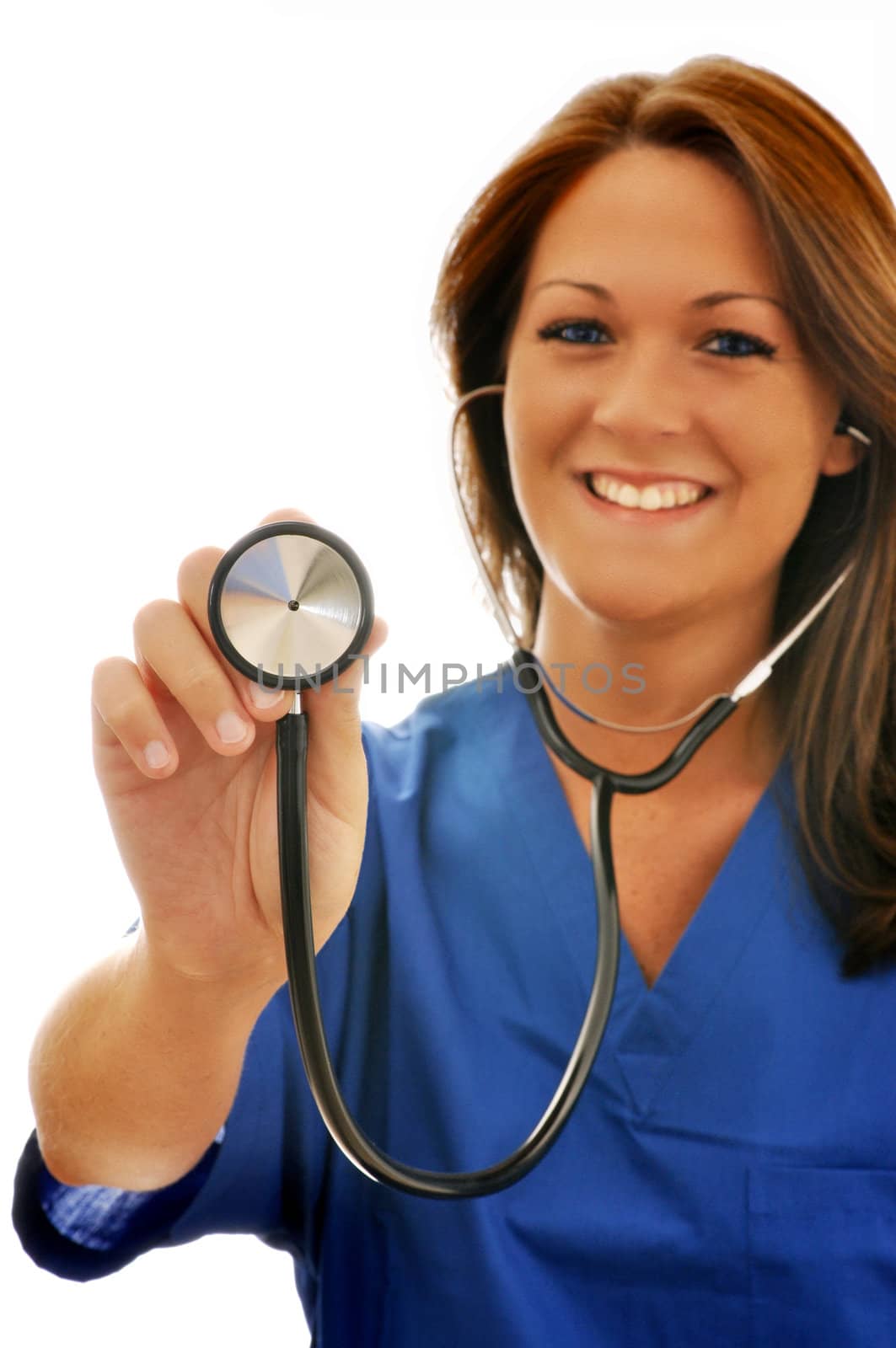 Smiling female nurse pointing stethoscope at camera.  Isolated on white background with copy space. 