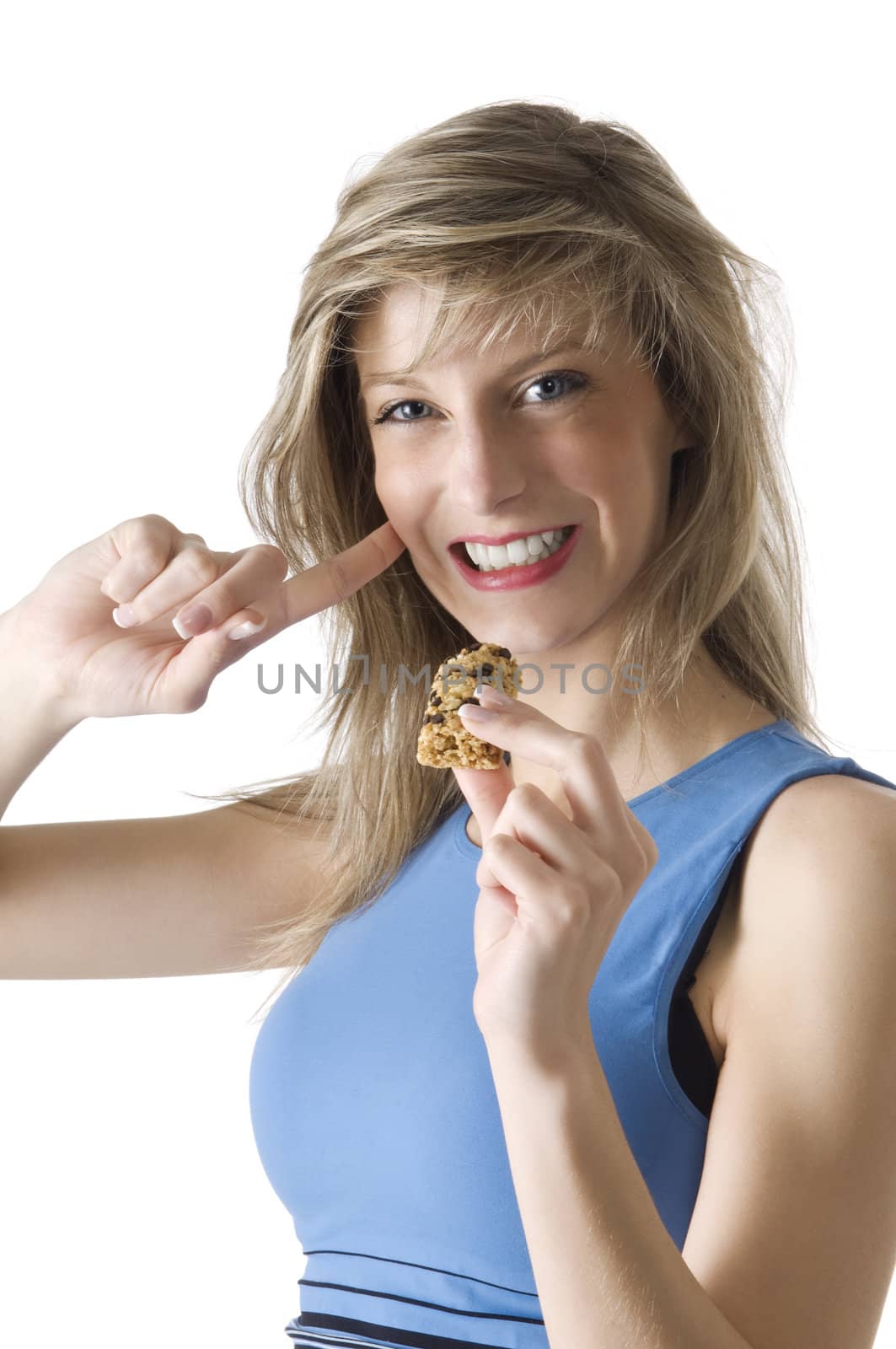 blond girl in blue chemise eating a diet tablet