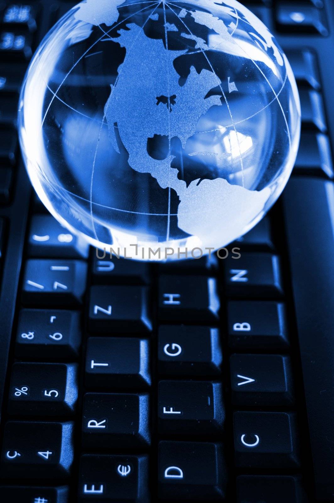 globe and keyboard showing global communication or internet concept