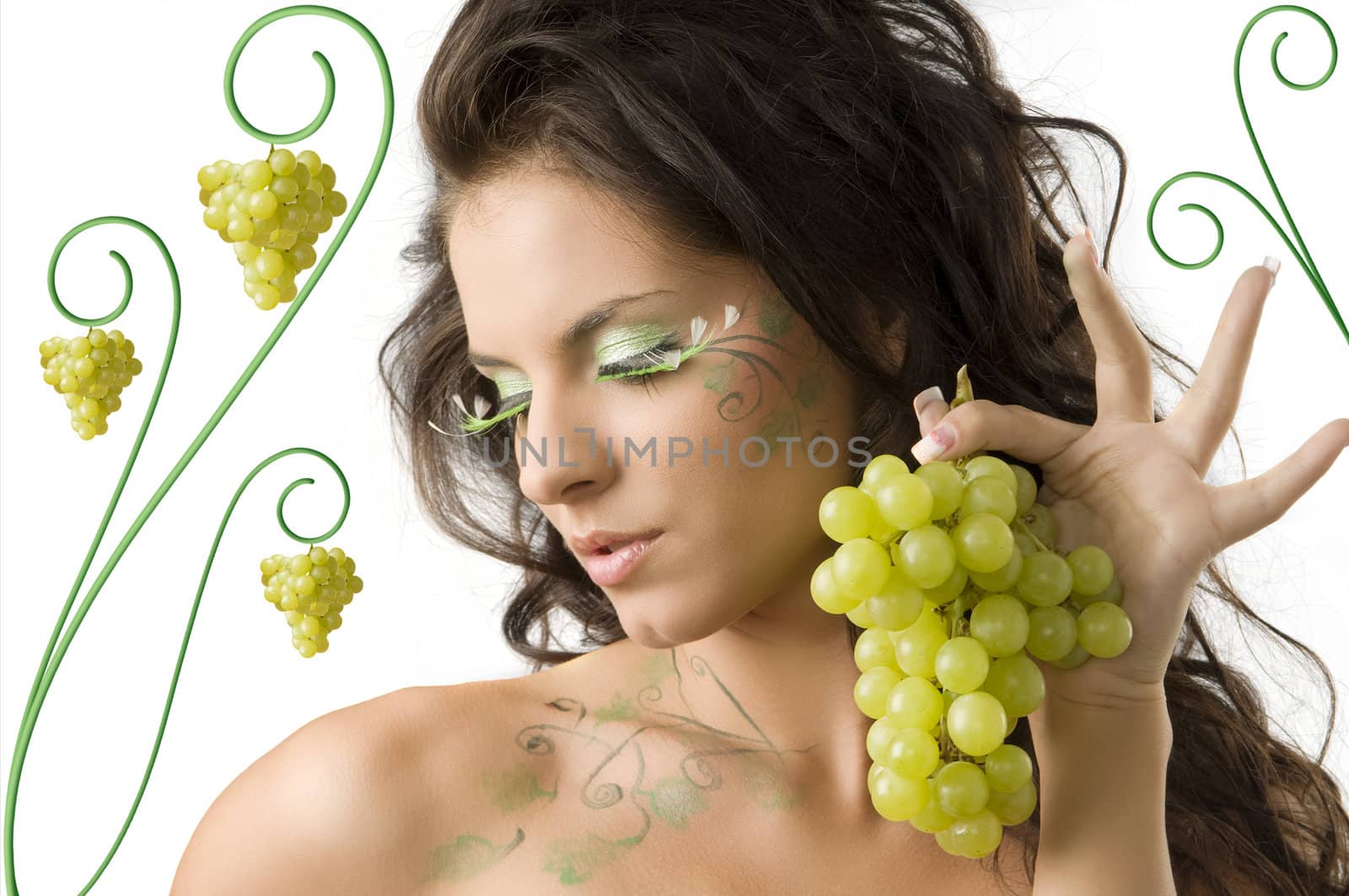 pretty girl with bodypaint on shoulder and face looking down with grape