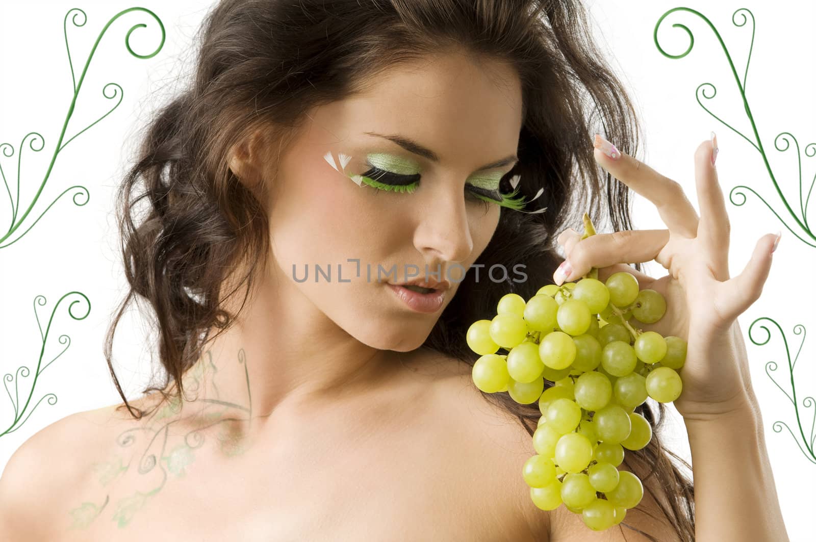 cute brunette with great green eylashes and some green grape