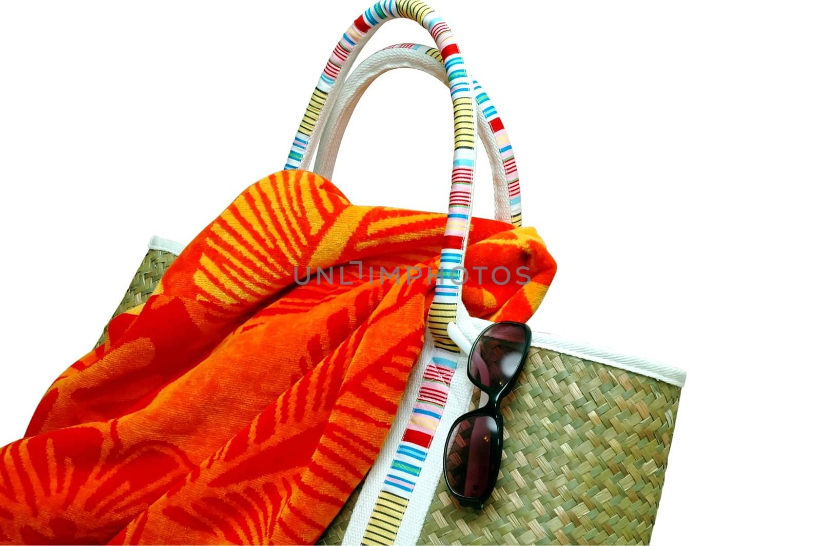 Beach bag with beach towel and sunglasses
