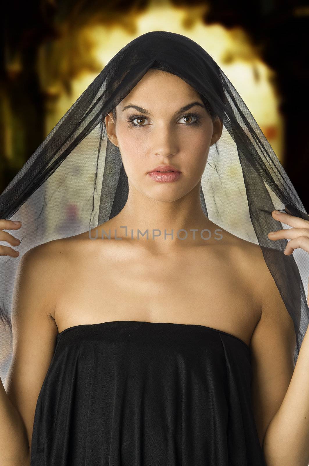 beautiful woman with a black veil on her head like black wife