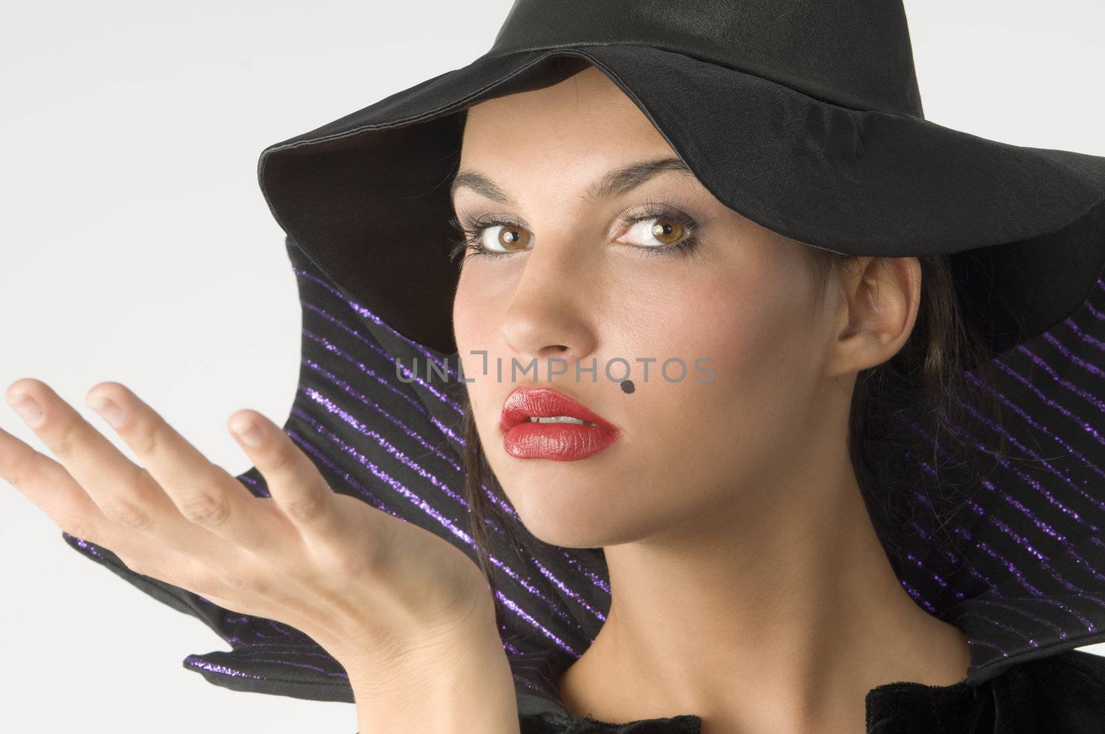 close up of a cute witch with hat and red lips