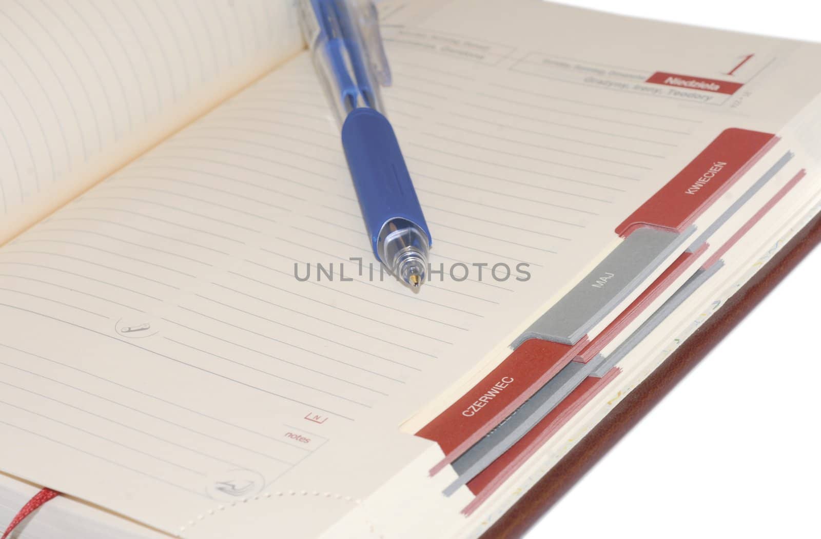 Elements of office. Notebook, pen. by wojciechkozlowski