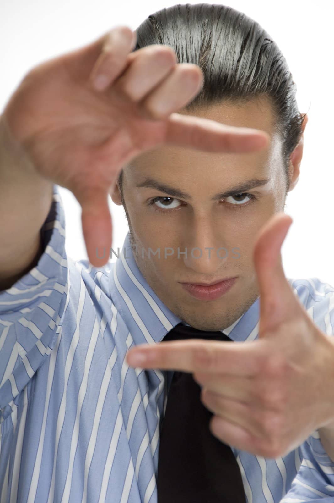 businessman making frame with hand gesture on an isolated white background