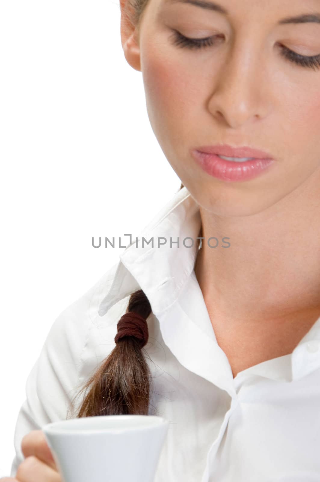 close up of lady holding cup of tea