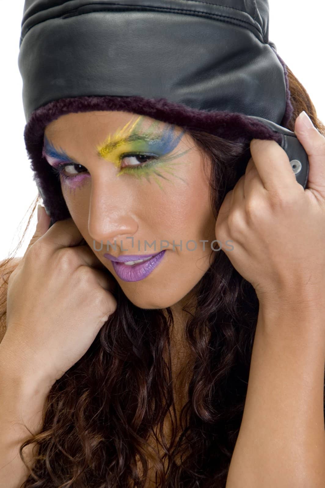 close up of woman holding her cap