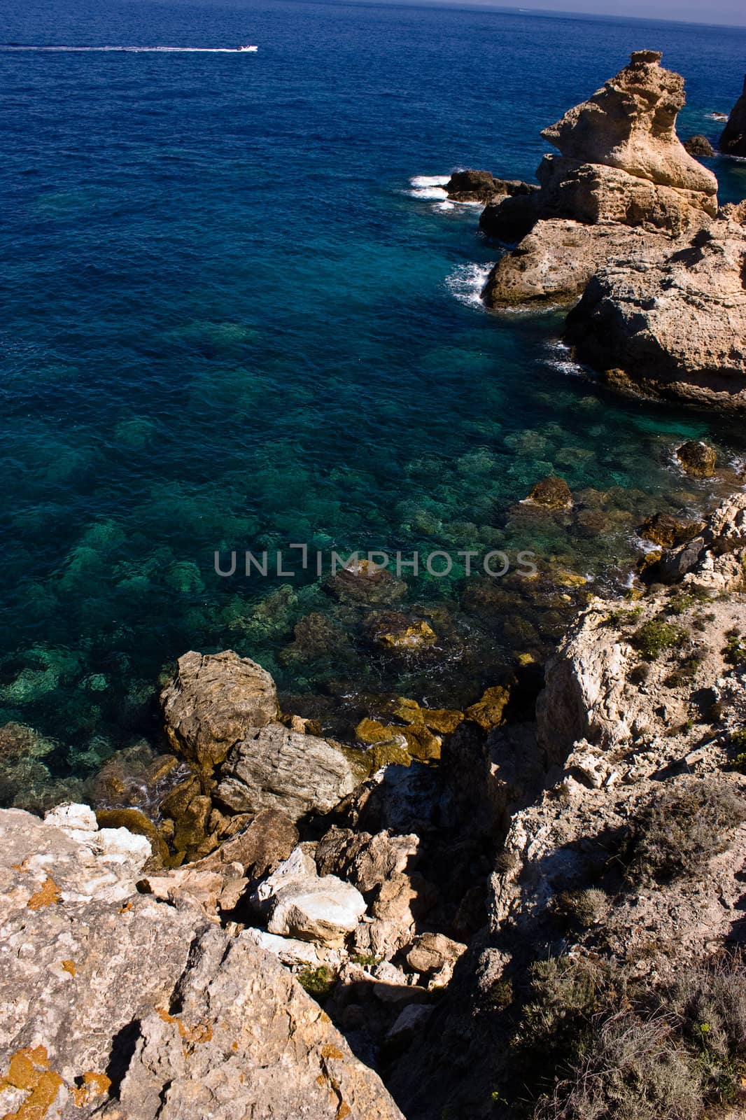 Looking out to sea from the top of a rocky cliff at Ponza island