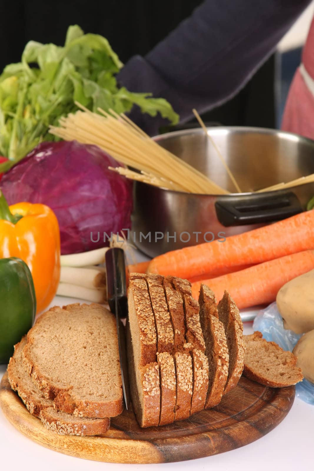 bread, carrot, red cabbage and peppers in close up