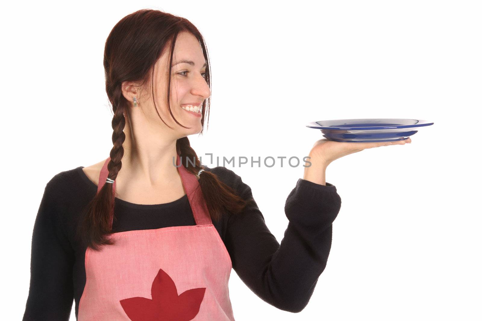 beautiful housewife holding empty plate on white background