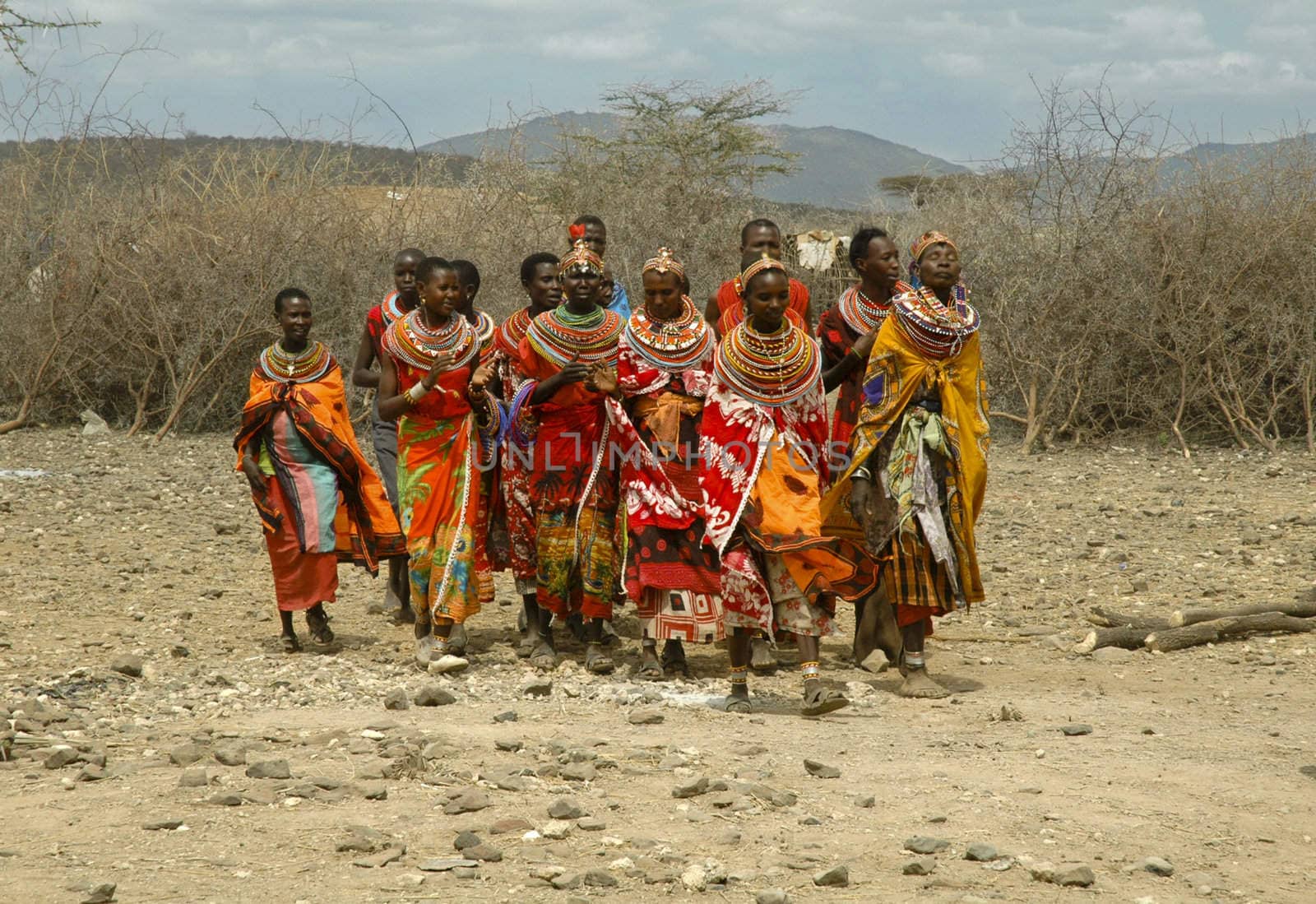 People singing in colourful clothes in Kenia