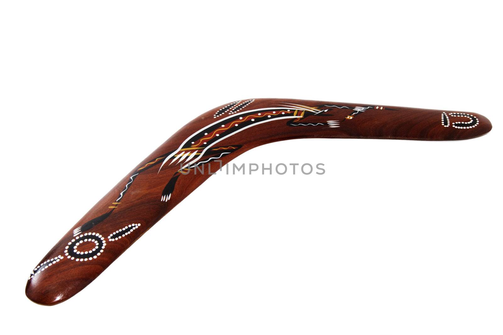one brown handmade boomerang on white background