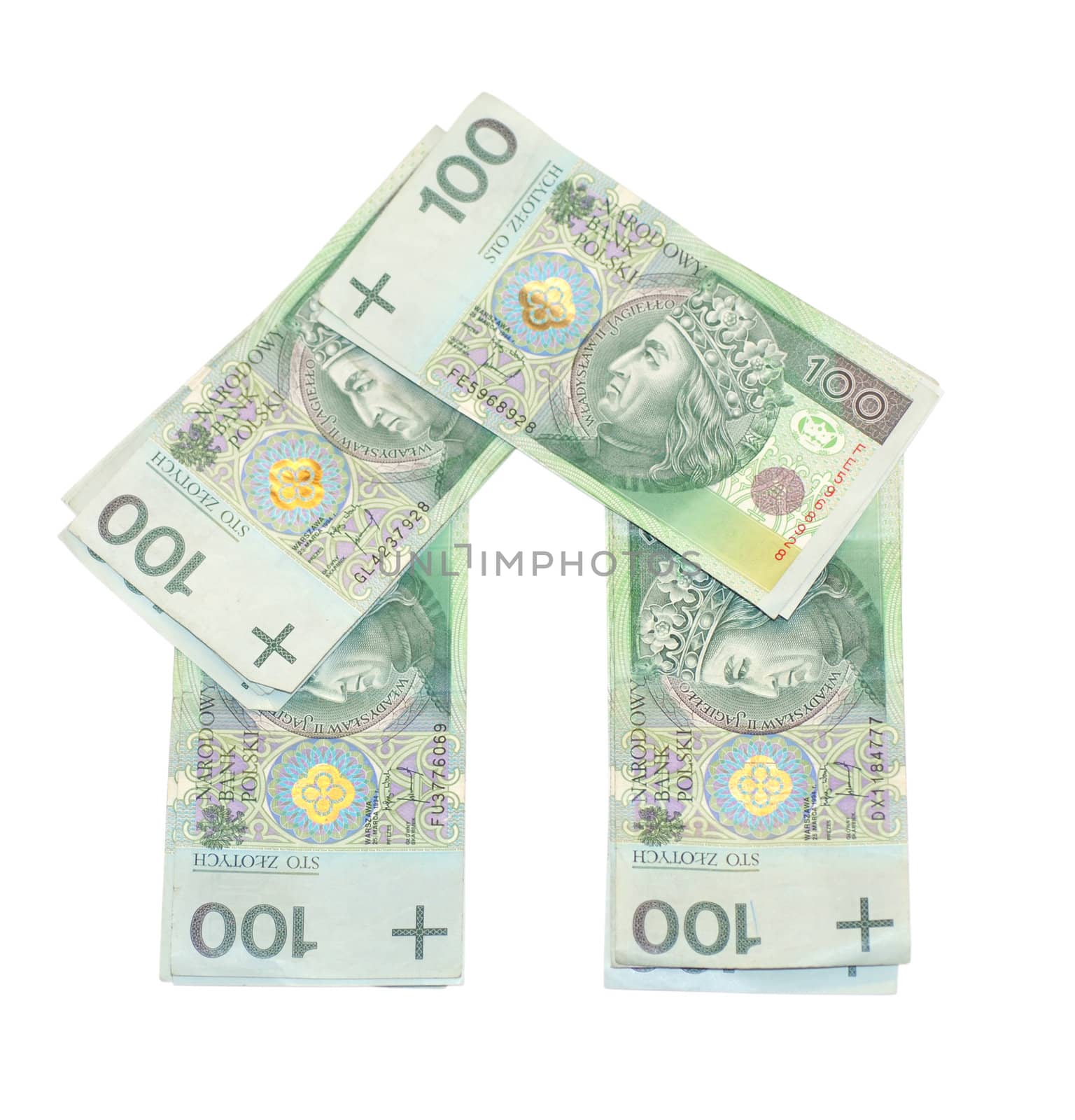 House built with the money. Banknotes PLN 100. Expensive housing