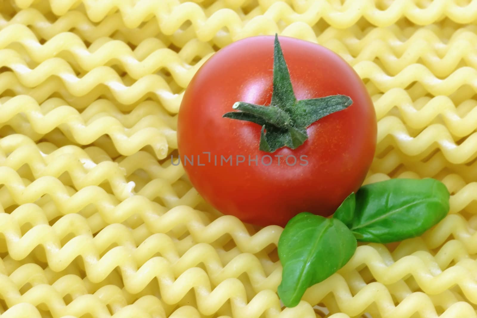 Raw pasta on bright background. Shot in Studio.