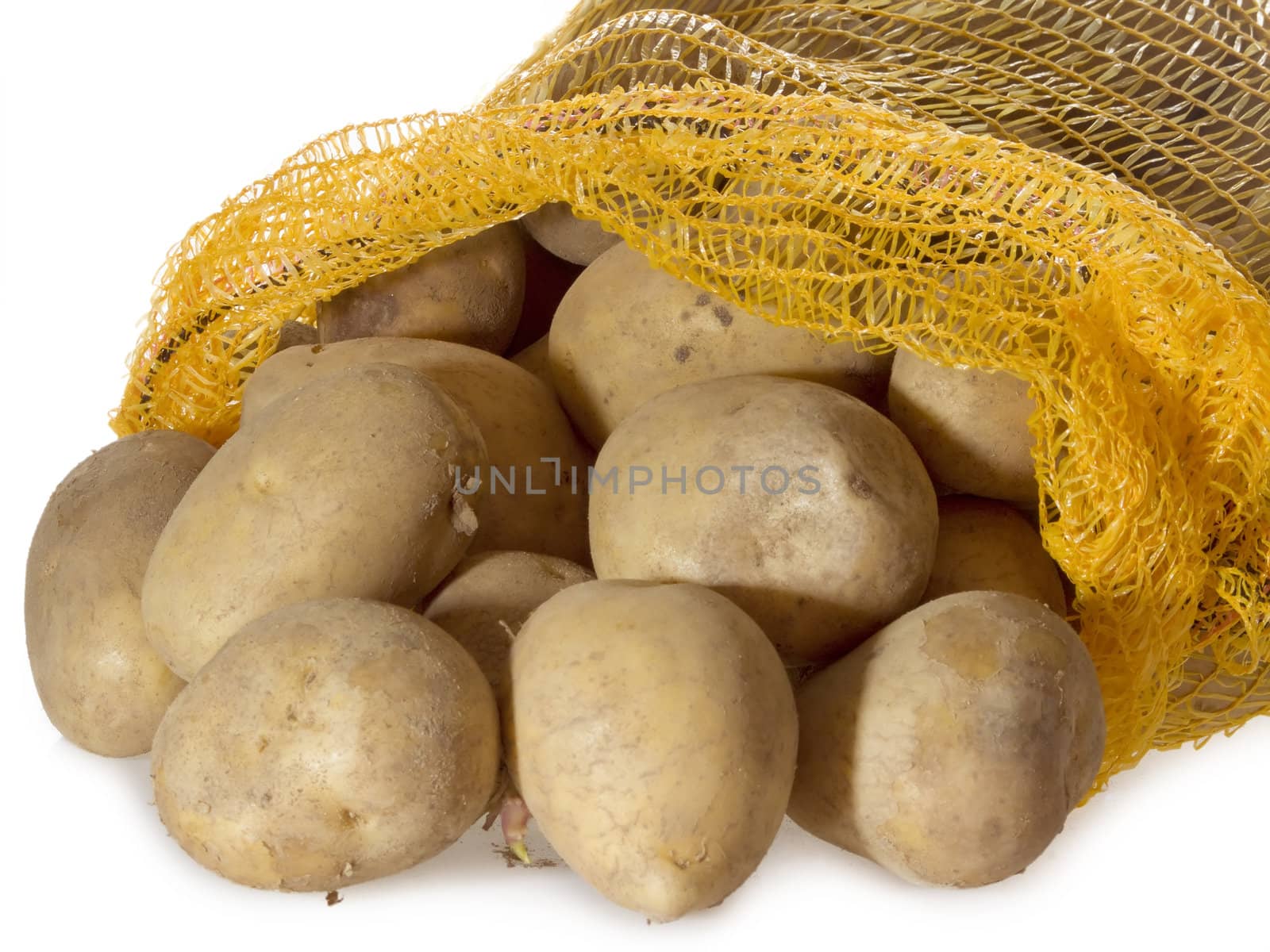 Potatoes in a sack on bright background